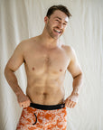Men's burnt orange bamboo underwear with white Kangaroo Paw print