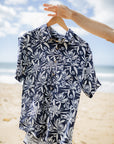 Hanging casual navy shirt featuring detailed white illustrations of Australian natives