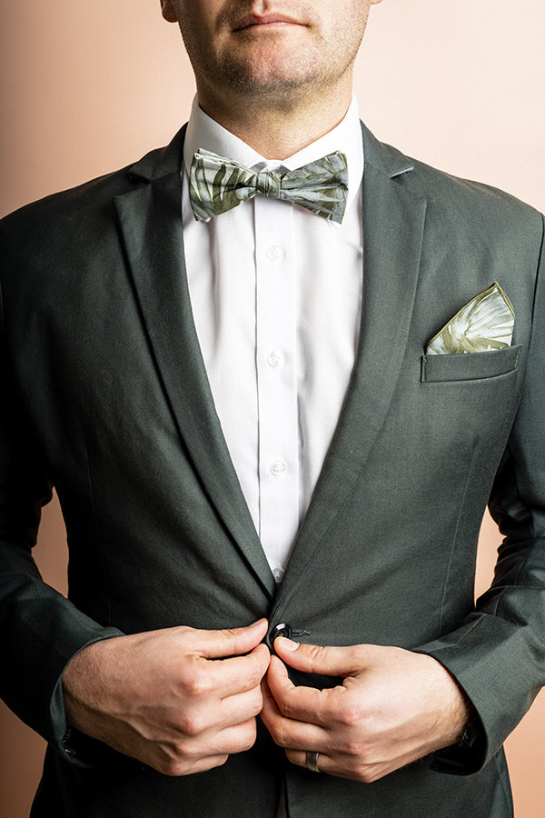 Modern and stylish bow tie featuring a detailed fan palm print in sage green, inspired by Australian native plants and designed in an abstract, minimalist style