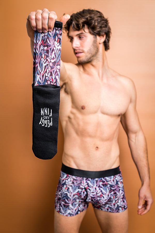 Eco-friendly boxer briefs featuring painted Protea flora against a stylish burgundy background