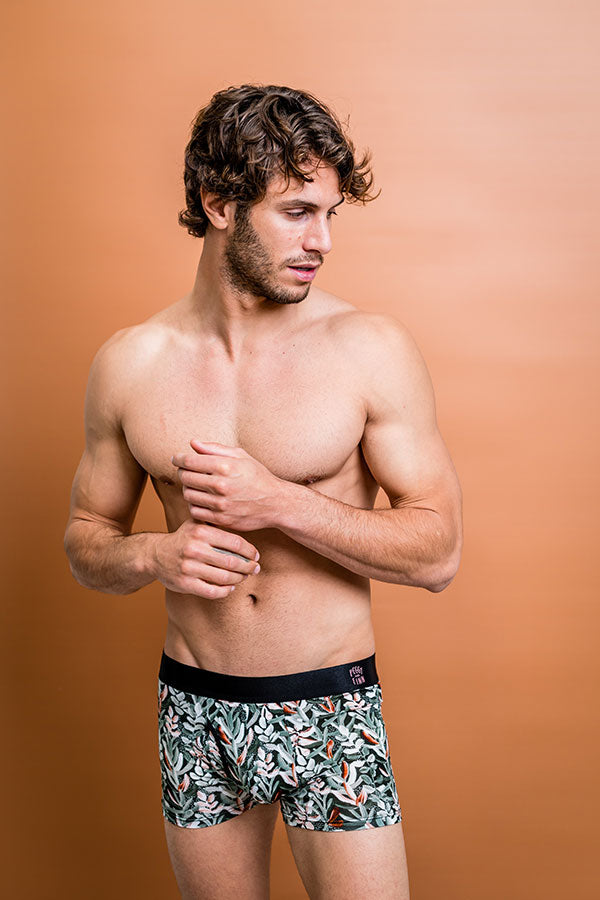 Eco-friendly boxer briefs featuring stylish Protea patterns on a green background