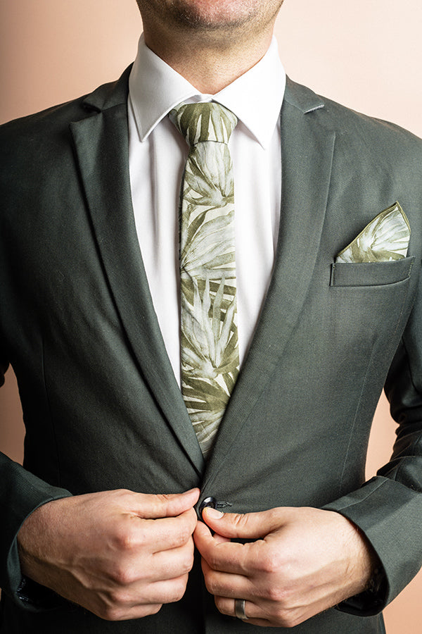 Elegant sage green cotton tie featuring a fan palm design inspired by the Australian Licuala ramsayi palm, ideal for stylish, nature-inspired attire